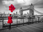 Woman with red balloons, standing on promenade near Tower Bridge, London, UK - Wall Art - By Assaf Frank- Gallery Art Company